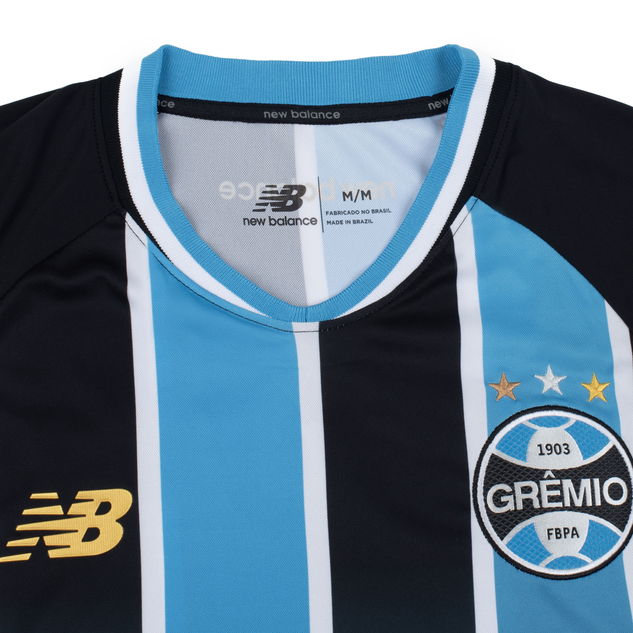 Camisa masculina Grêmio 2026 New Balance azul vista frontal com detalhes do time